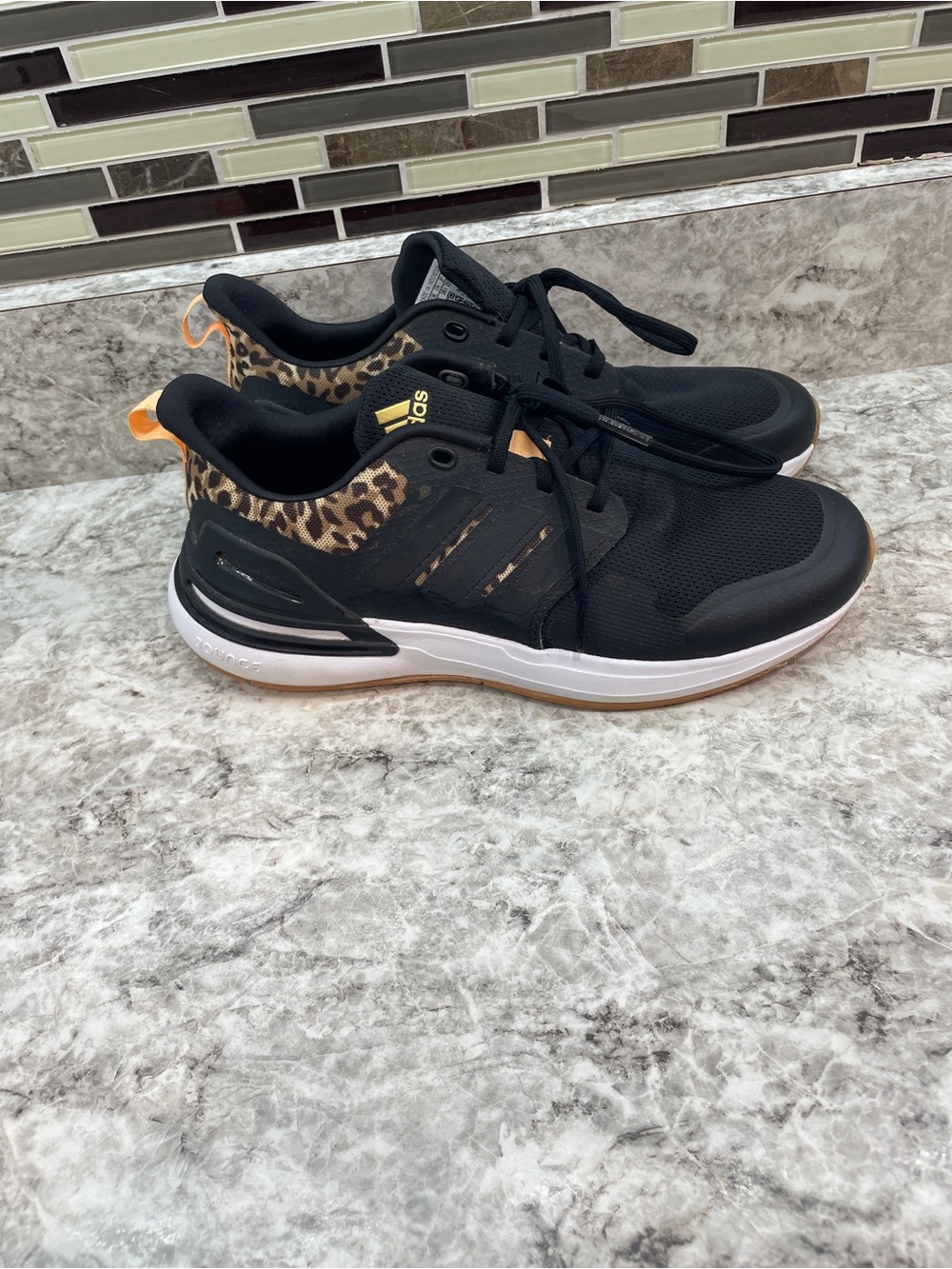 Adidas RapidaSport leapord print kids size 6.5